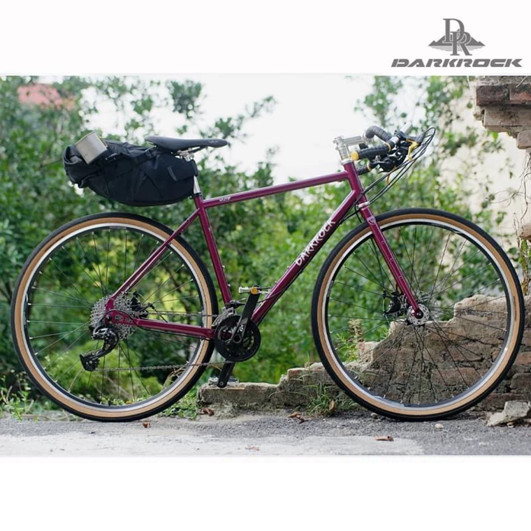 purple bicycle darkrock touring bike, side views